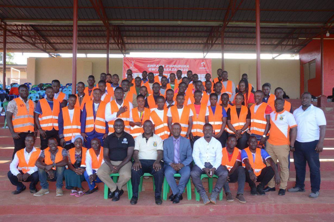 Hon. Serwanga Ssalongo with football managers and some players Hon. Serwanga Ssalongo with football managers and some players